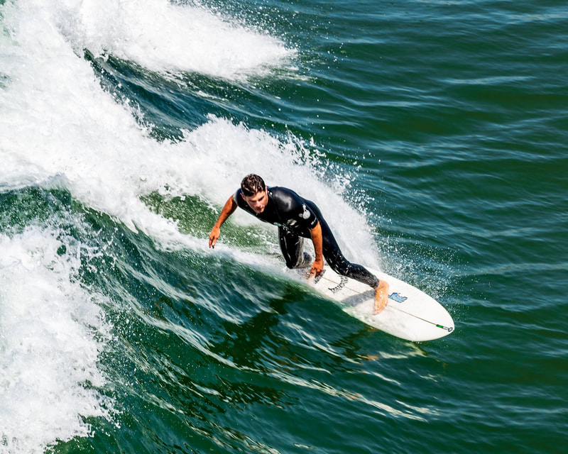 a surfer during the take-off